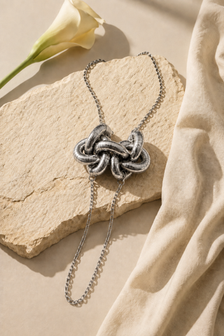 Sunny Leone In Metallic Silver Knot Necklace